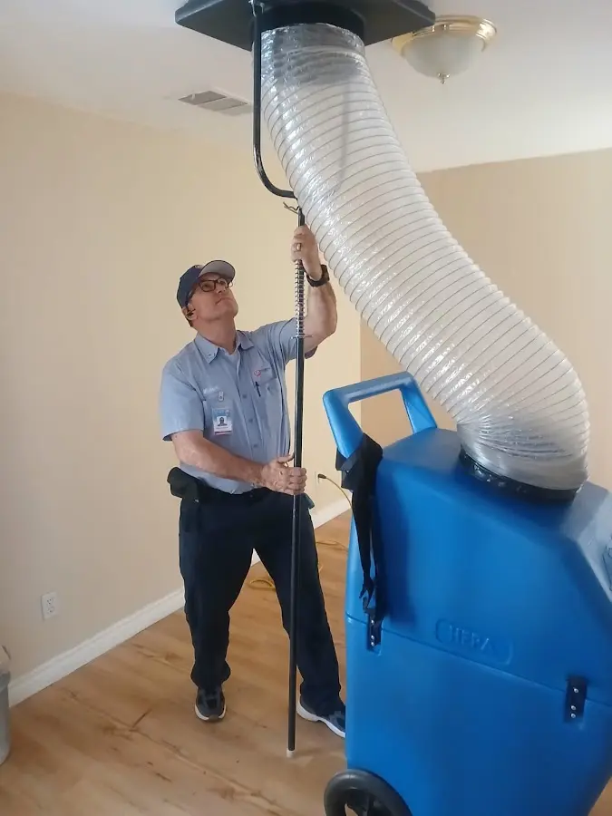 HVAC Installation technician using HEPA equipment in Urbana